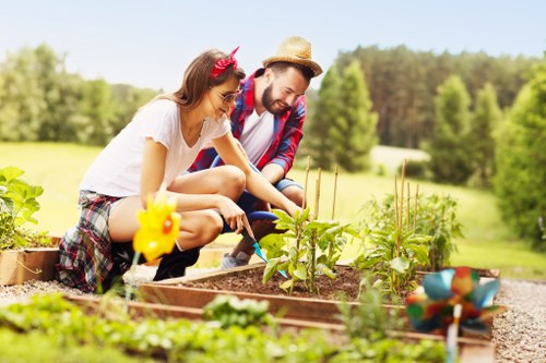Front view of a gardener inspecting a lawn